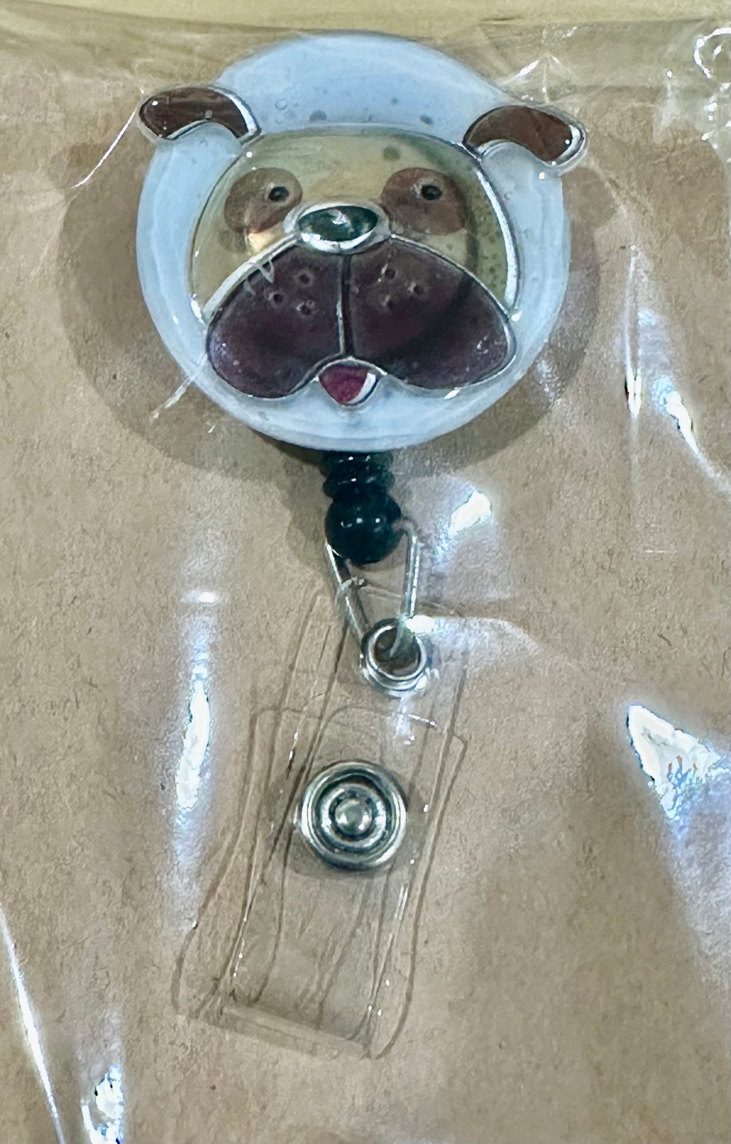 Doggy badge reel with belt clip
