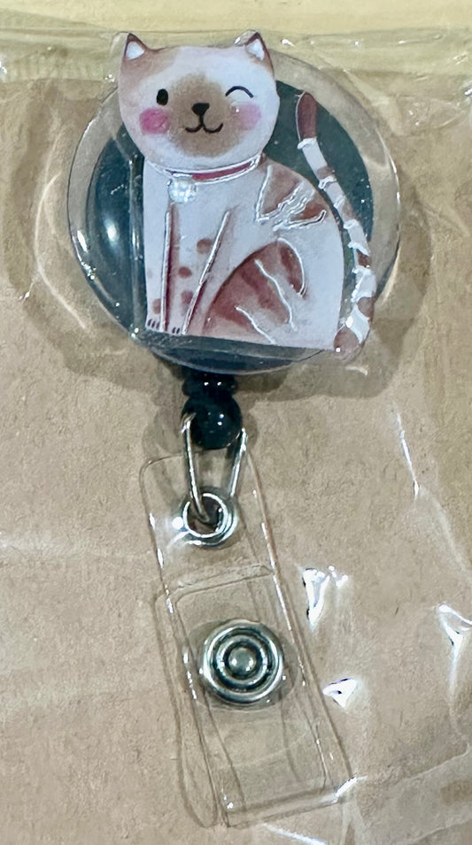 Winking Cat badge reel with belt clip